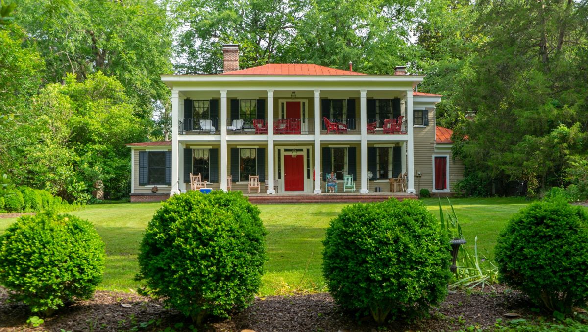 Exterior of Bellamy Manor and Gardens during daytime in Enfield