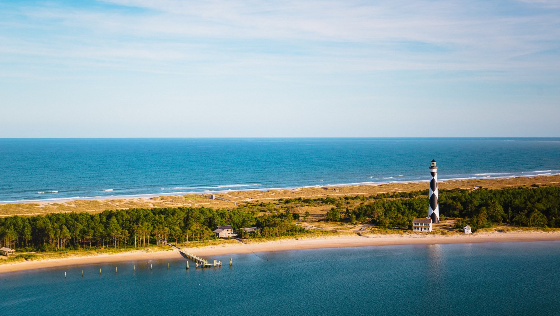 A lighthouse on a beach