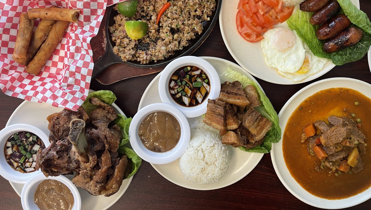 Overhead of plates of different international foods