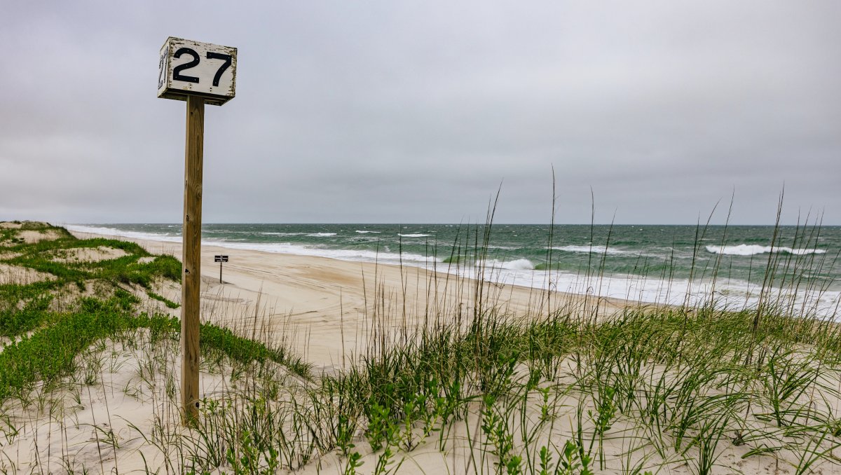 Ramp 27 off-road vehicle access point in Hatteras with beach and ocean in background