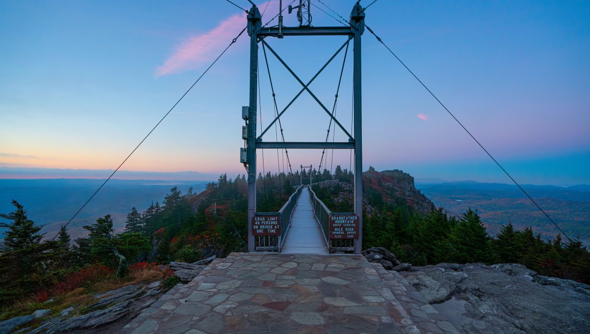 Early morning view from Grandfather Mountain's Mile High Swinging Bridge surrounded by early fall colors