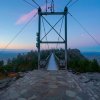 Early morning view from Grandfather Mountain's Mile High Swinging Bridge surrounded by early fall colors