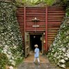 Child walking into gold mine tunnel underground