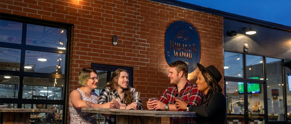 group gathering at Tobacco Wood Brewing