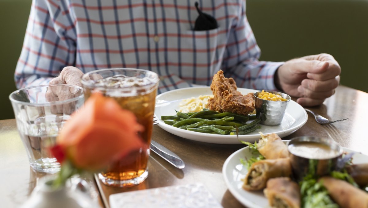 Closeup of two plates of food on table at Southern restaurant